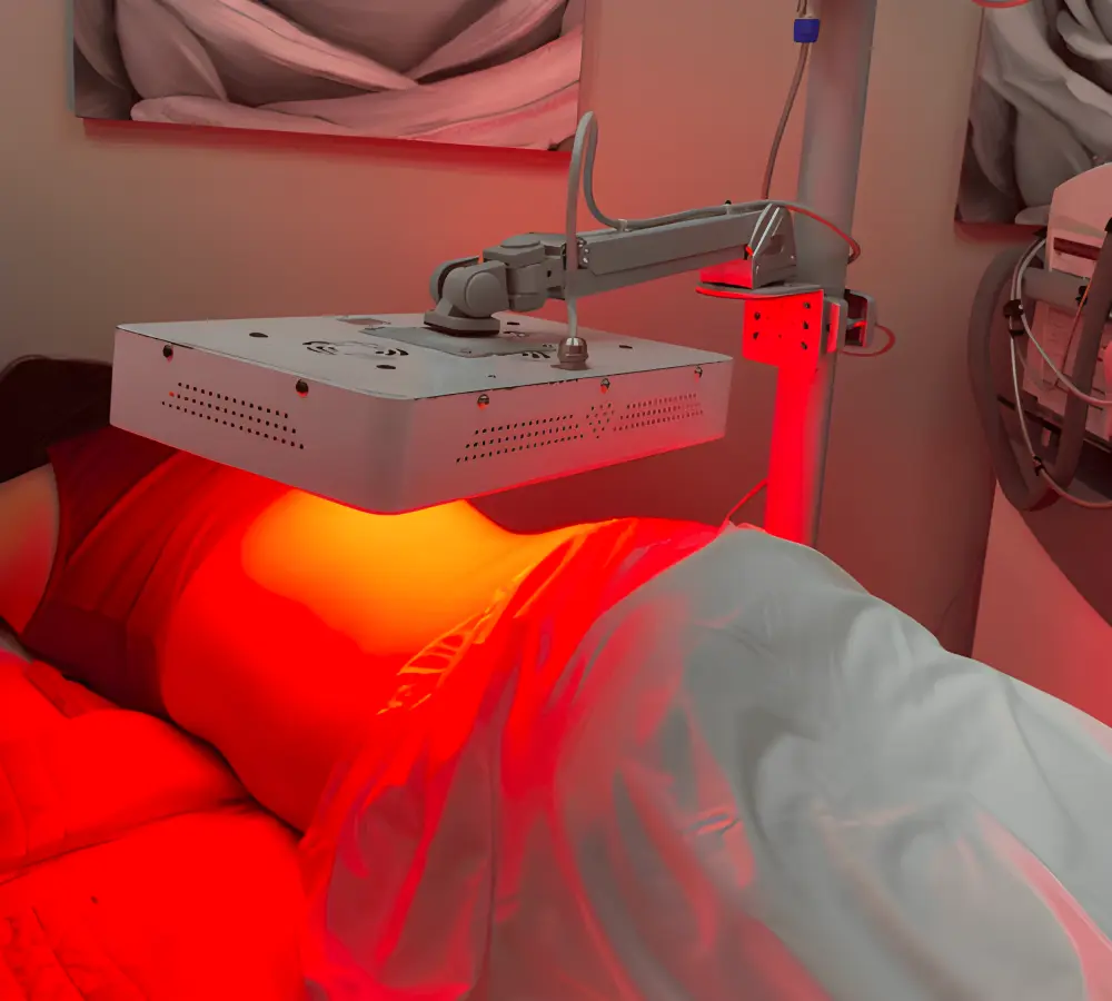 Tratamiento de luz infrarroja en abdomen.